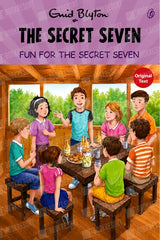 Book cover for 'The Secret Seven' by Enid Blyton, featuring an illustration of seven children gathered around a table in a wooden cabin with green trees visible outside the windows.